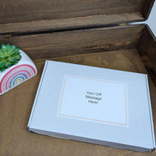 Load image into Gallery viewer, A Terry’s Chocolate Orange Letterbox Gift, including assorted Terry’s Chocolate Orange bars, presented in a colorful tissue-lined box.
