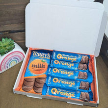 Load image into Gallery viewer, A Terry’s Chocolate Orange Letterbox Gift, including assorted Terry’s Chocolate Orange bars, presented in a colorful tissue-lined box.
