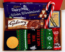 Cargar imagen en el visor de la galería, Men’s Christmas Letterbox Gift from The Happiness Box - festive chocolates, socks, and puzzle game in red tissue-lined box
