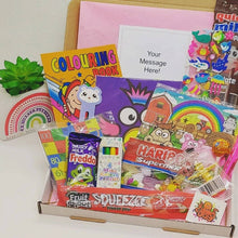 Cargar imagen en el visor de la galería, A colourful Children’s Letterbox Gift from The Happiness Box, filled with treats and activities, lined with tissue paper.
