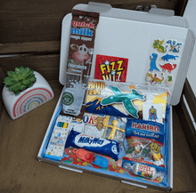 Load image into Gallery viewer, A colourful Children’s Letterbox Gift from The Happiness Box, filled with treats and activities, lined with tissue paper.
