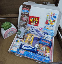 Load image into Gallery viewer, A colourful Children’s Letterbox Gift from The Happiness Box, filled with treats and activities, lined with tissue paper.
