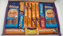 Load image into Gallery viewer, Large Chocolate Orange Letterbox Gift with Terry’s, Lindt, and Fry’s orange-flavoured chocolates in a gift box from The Happiness Box, Kent, UK.
