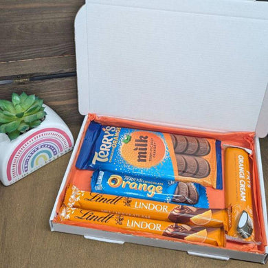 Chocolate Orange Letterbox Gift with Terry’s, Lindt, and Fry’s orange-flavoured chocolates in a gift box from The Happiness Box, Kent, UK.