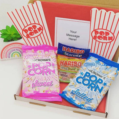 The Movie Night Letterbox Gift including popcorn, popcorn boxes, and Haribo treats.